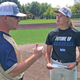 Coach Scott Kushner and Mary Schoenke talk over a few things.